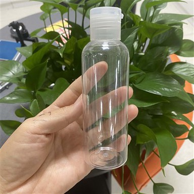 Läbipaistev klappkorgiga plastpudel